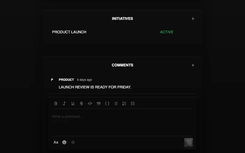 A Corporate Suite goal record in dark mode showing linked initiatives and discussion